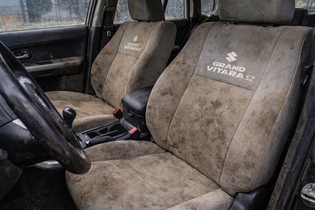 dirty-car-seats-with-grand-vitara-logo-qhpayb0zidq